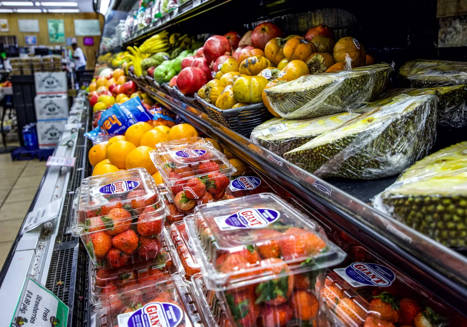 Fresh fruit and packaged berries on display at The Fruit Bowl.